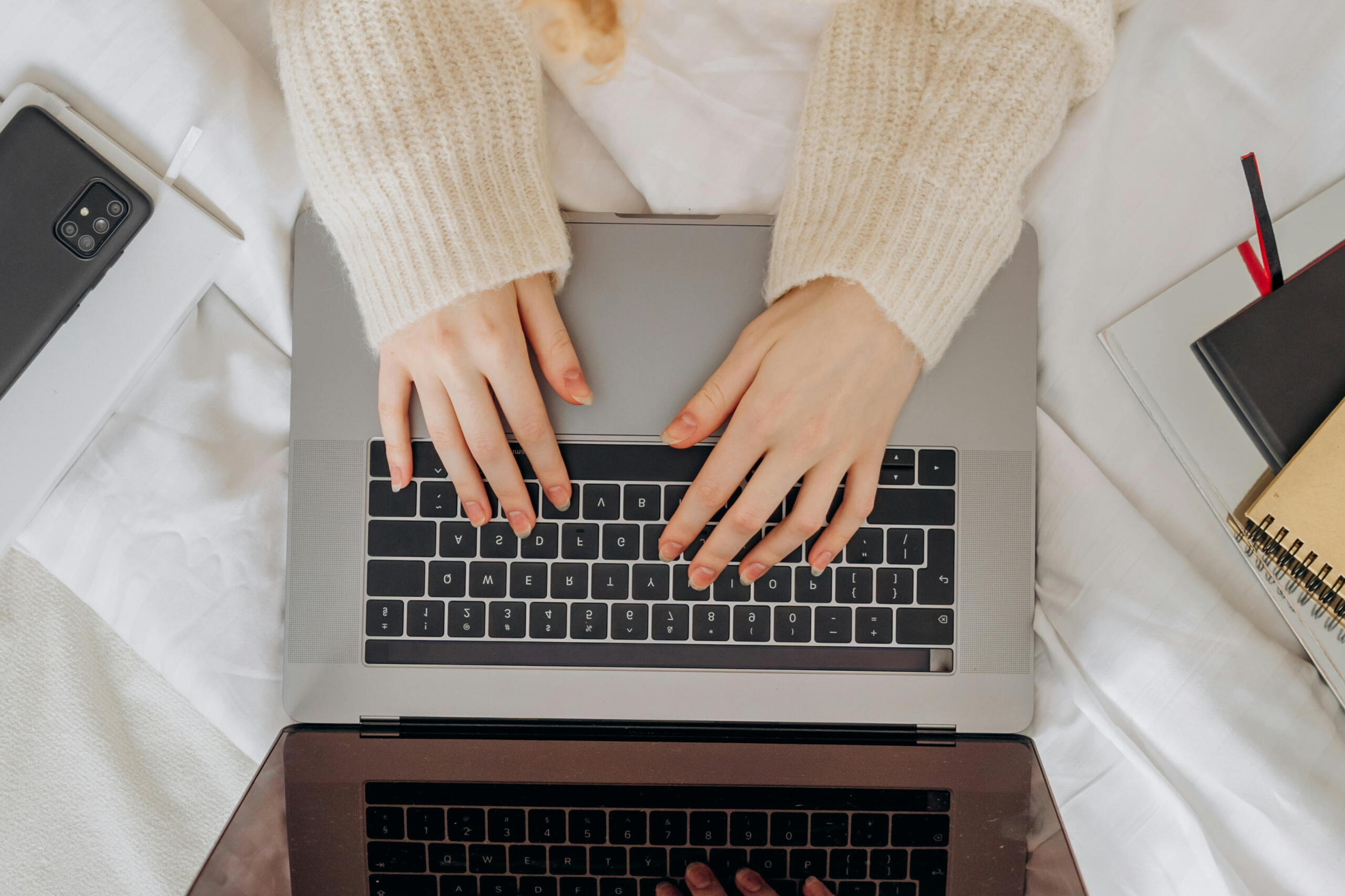 A journal with the quote ‘Put yourself at the top of your to-do list’, surrounded by soft textures and calm tones — inviting a moment of self-reflection.